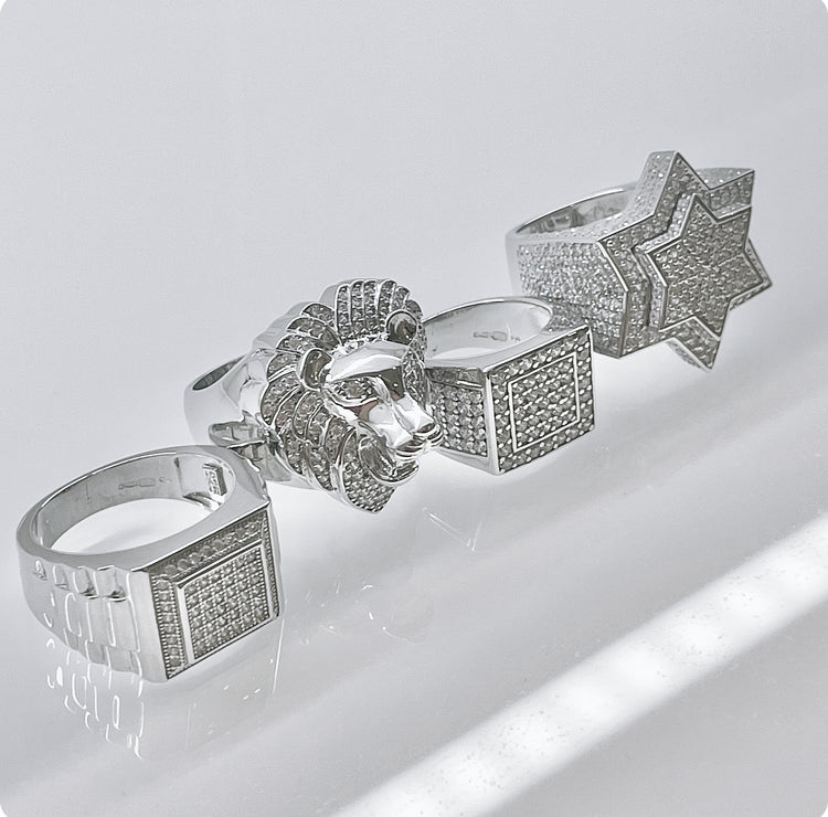 Silver diamond set lion's head ring. Diamonds set in eyes and mane of the lion.